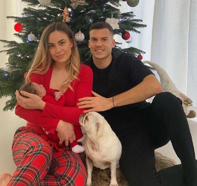 Laszlo Benes with his wife Victoria Benes and newborn daughter Liana during Christmas